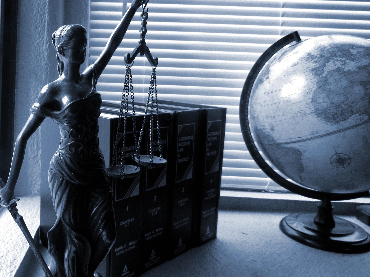 Lady Justice scales in law office